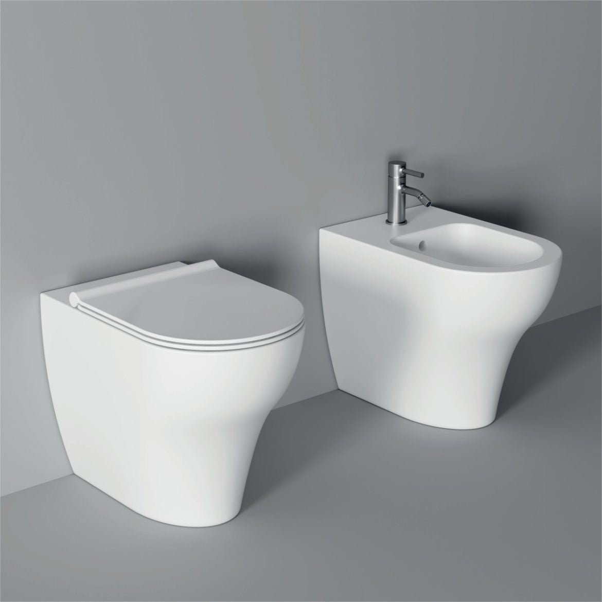 Coppia sanitari a terra filomuro Alice Ceramica Unica senza brida con coprivaso soft close